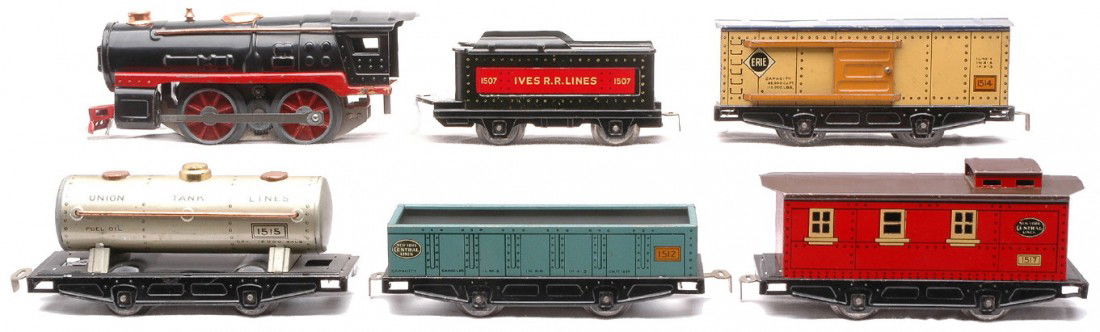 Ives Litho Freight 1506 1507 1512 1514 1515 1517: Ives prewar O gauge Irvington Production lithographed freight set, circa 1931-32 containing; 1506 black 0-4-0 steam loco with red frame and copper trim, 1507 tender, 1512 NYC gondola, 1514 Erie boxcar