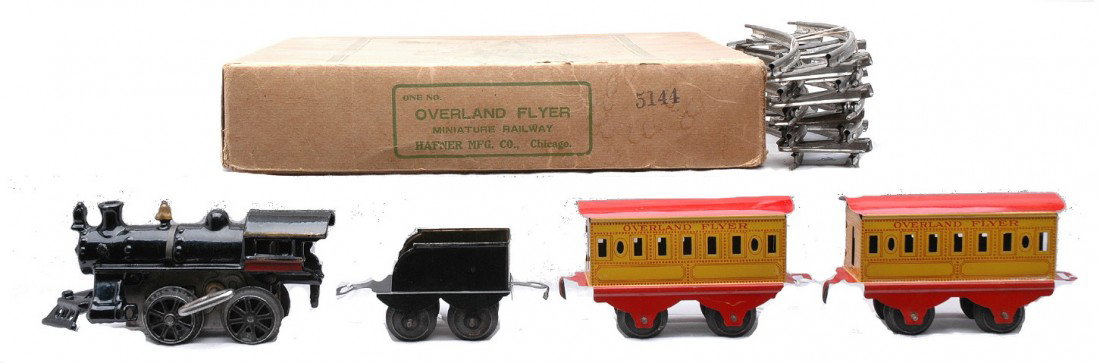 Hafner Overland Flyer Litho Passenger Set 5144 OB: Hafner Overland Flyer prewar O gauge lithographed passenger set no. 5144 in set box with original cardboard dividers containing; 109 black cast iron clockwork 0-4-0 steam loco, 1181 black unstamped te