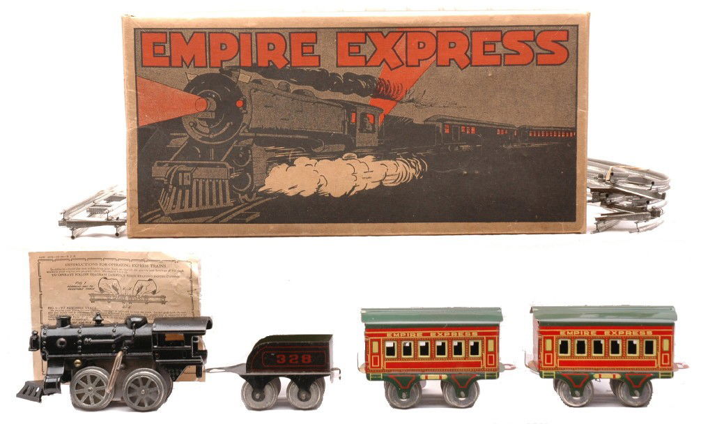 AF Hummer Empire Express Pass Set 802 OB: American Flyer Hummer prewar O gauge Empire Express lithographed passenger set no. 802 in set box containing; no. 902 . black cast iron clockwork 0-4-0 steam loco, 328 tender. two four wheel coaches,