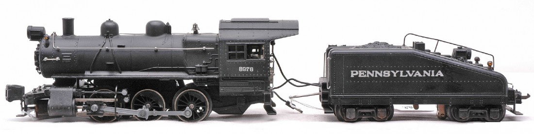 Lionel 228 Switcher 2228B Pennsy Tender LN: Lionel prewar O gauge 228 black 0-6-0 switcher with a 2228B Pennsylvania slope back tender. The lettering on the tender is very strong. The loco and tender have light run time and are C8.
