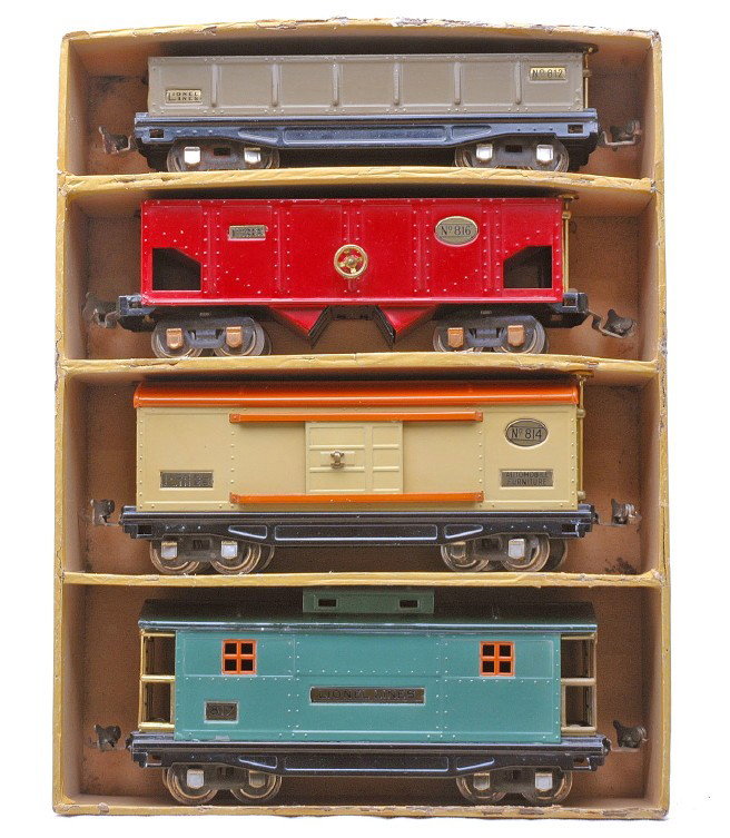 Lionel 818 Car Assortment 812 816 814 817: Lionel prewar O gauge 818 800 series freight car assortment in yellow OB containing; 812 Mojave gondola, 816 red hopper, 814 cream boxcar with orange roof and a 817 peacock caboose with a dark green r