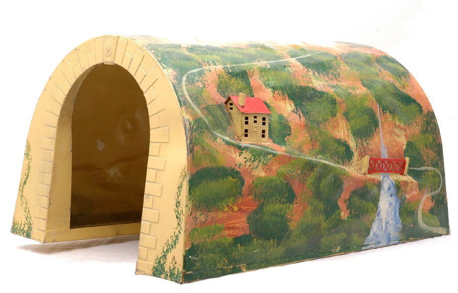 Lionel Prewar 120L Illuminated Metal Tunnel: Lionel prewar standard gauge 120L illuminated metal tunnel. The colors on the tunnel are vibrant. The tunnel does have some nicks and is C7.