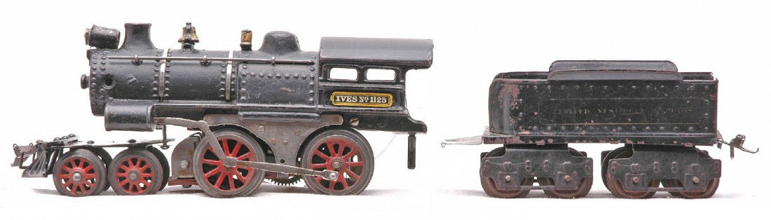 Ives 1125 Black Steam Loco no. 25 Tender: Ives prewar O gauge 1125 black 4-4-0 steam loco and an eight wheel no. 25 tender lettered Limited Vestibule Express. The loco has plates under the cab windows. The loco is C6-7 and the tender is C5.