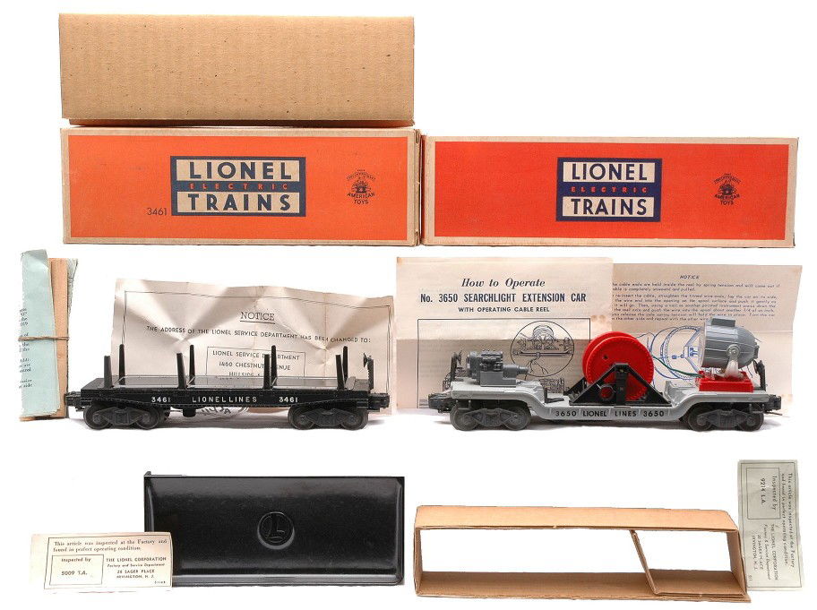 Lionel 3461 Lumber Car 3650 Searchlight Ext MIB: Lionel postwar 3461 automatic lumber car with wood load, 160 bin, instruction sheet and inspection tag in OB with original cardboard insert. Also included is a 3650 searchlight extension car with inst