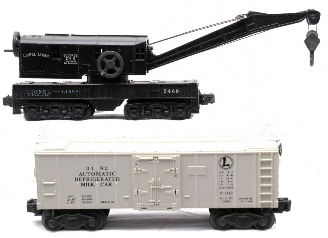 Lionel 2460 Crane Car 3482 Milk Car: Lionel postwar 2460 black Bucyrus Erie crane car and a 3482 automatic refrigerated milk car. The crane is C8 and the milk car is C7-8.