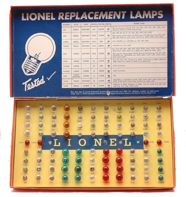 Lionel 123 Replacement Lamp Assortment OB: Lionel postwar 123 replacement lamp assortment for model trains and accessories complete with all bulbs in OB with original cardboard insert, C8. The lid has tape repair on the hinge section. The box 