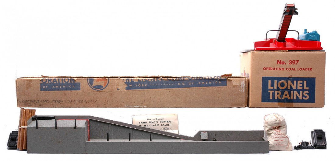 Lionel 397 Coal Loader 364 Lumber Loader OB: Lionel postwar 397 operating coal loader with 206 bag of coal and 364C controller all in reproduction box. The plastic shield on the 397 is broken, however a reproduction part is included. The 397 is