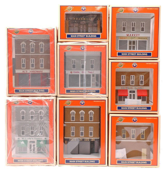 Lionel 8 Lionelville Main Street Buildings MIB: Lionel Lionelville Main Street Buildings including; 34124 AnastasiaÕs Bakery, 34125 CottonÕs Candy, 34126 Market, 34127 OÕGradyÕs Tavern, 34128 Pharmacy, 34129 Kiddie City Toy Store, 34130 JimÕs 