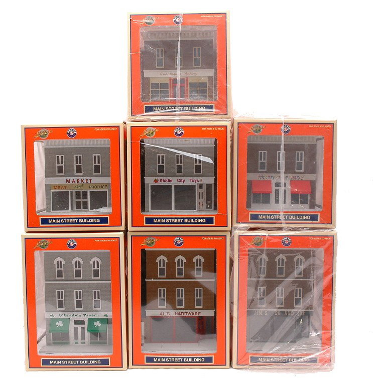 Lionel 7 Lionelville Main Street Buildings MIB: Lionel Lionelville Main Street Buildings including; 34124 AnastasiaÕs Bakery, 34125 CottonÕs Candy, 34126 Market, 34127 OÕGradyÕs Tavern, 34129 Kiddie City Toy Store, 34130 JimÕs 5 & 10 and 34131
