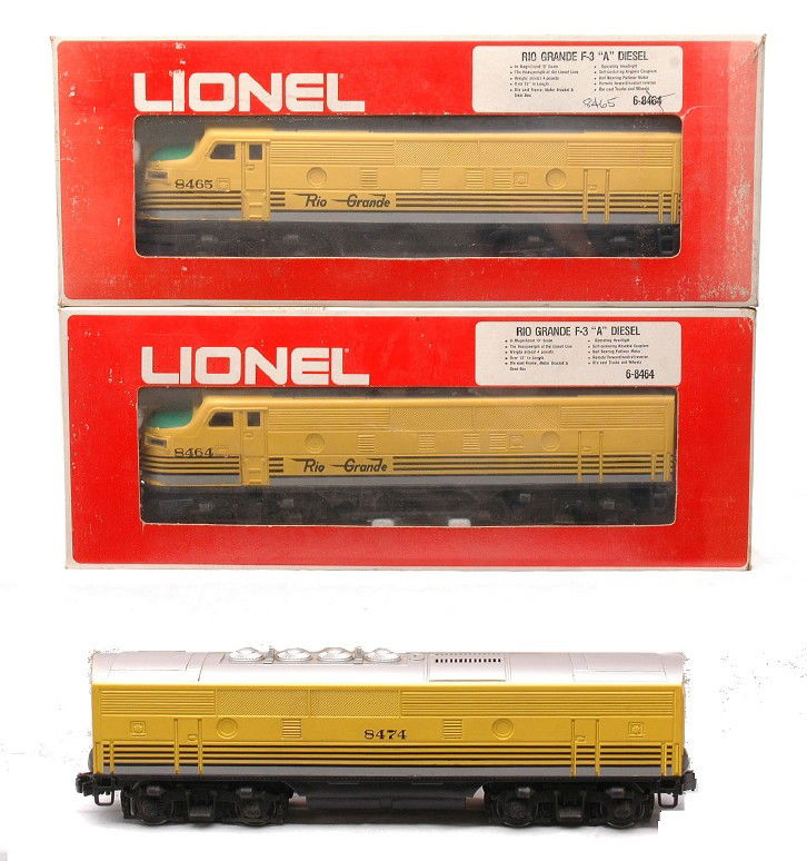 Lionel 8464/8474/8465 Rio Grande F3 ABA Units: Lionel 8464/8474/8465 Rio Grande F3 ABA diesel units. The 8464 is in OB and the 8465 is in an incorrect 8464 OB. The 8464 cab is on a Lionel postwar chassis. The chassis has battery damage and is C6.