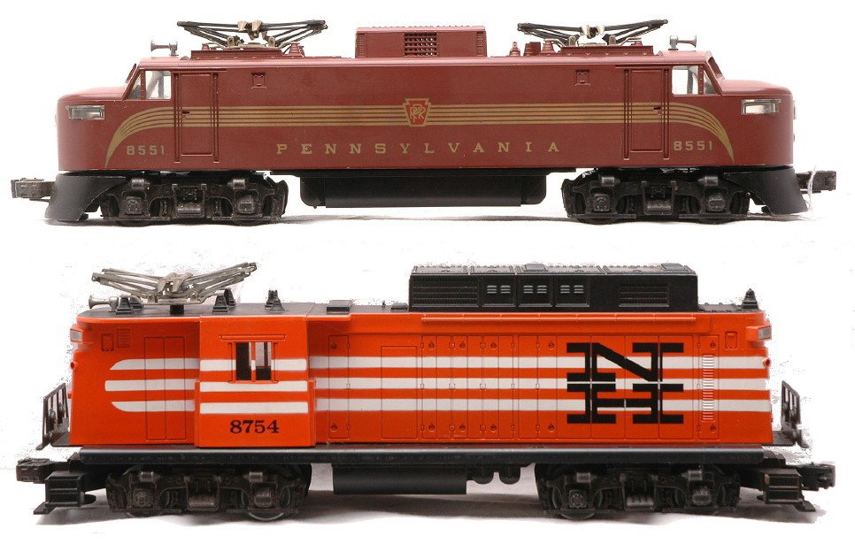 Lionel 8551 PRR EP-5 Loco 8754 NH E-33 Locos: Lionel 8551 Pennsylvania EP-5 electric loco with two motors and a 8754 New Haven E-33 electric loco that has no motor and is missing the railings. The 8551 is C7 and the 8754 is C6.