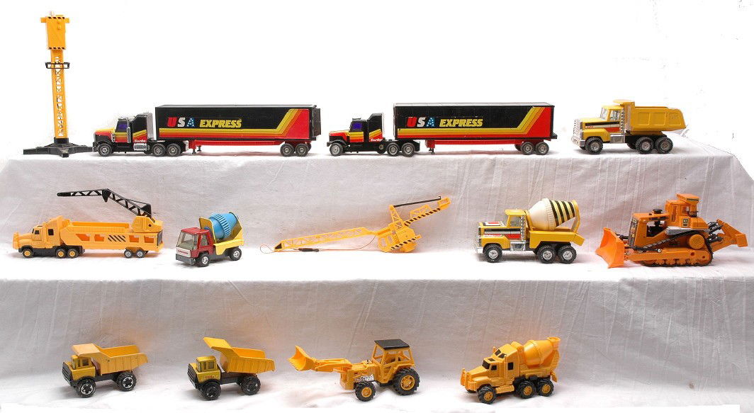 Selection of Tonka Kao Shek Toys New Bright: A selection of Tonka, New Bright, Kao Shek Toys and Nylint trucks, cement mixers and dozers. Please view photo to verify selection and condition. This lot will be sold as is with no returns.