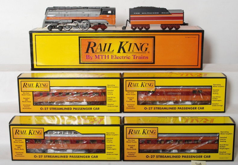 Railking Hiawatha locomotive and 4 car pass set: MTH Railking modern O gauge Milwaukee Road Hiawatha 30-1127-1 steam locomotive and 30-6090 four car passenger set in OBs. Loco features Protosound, Protosmoke, Protocoupler, and more. Loco and cars ar