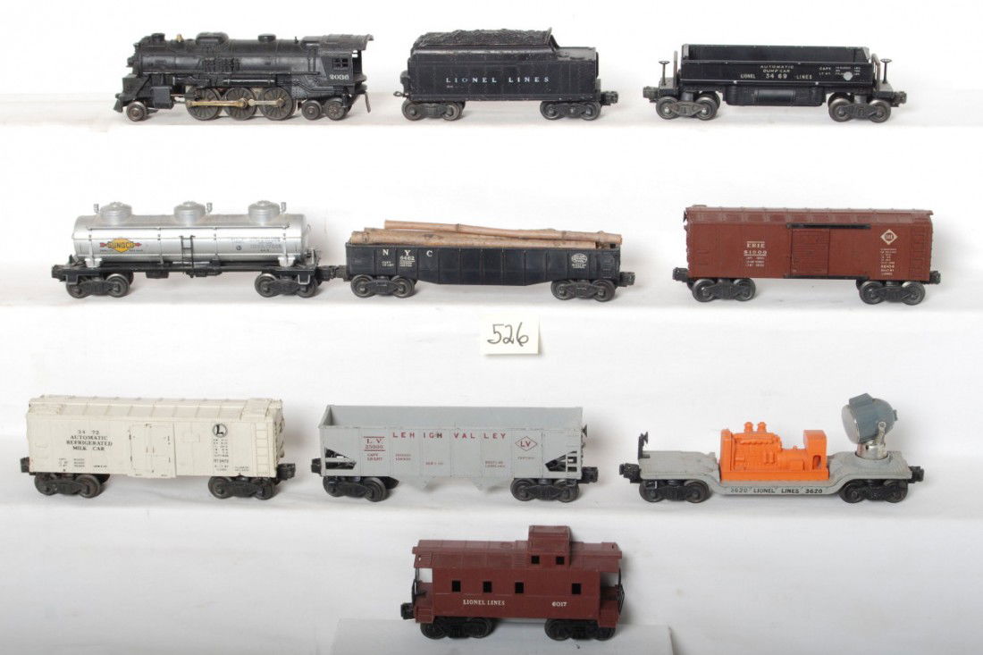 Lionel 2036, tender, 6462, 3469, 6454, 3472, 6456,: Postwar Lionel O gauge 2036 steam locomotive, unnumbered tender w/o whistle chipped shell, 6462 New York Central gondola nicked rib, 3469 automatic dump car, X6454 Erie boxcar, 3472 operating milk car