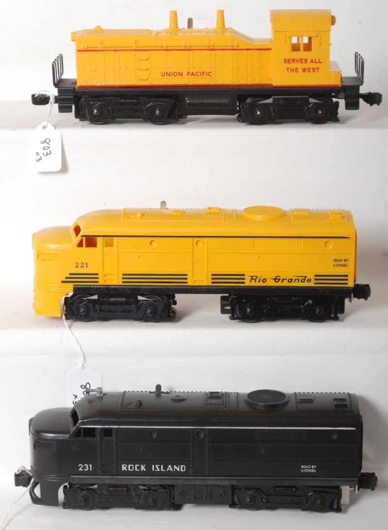 Lionel No. 645, 221, 231 diesel locomotives: Postwar Lionel O gauge No. 645 Union Pacific NW-2 diesel switcher, 221 Rio Grande Alco diesel, and 231 Rock Island Alco diesel, trains look great clean and shiny C8 area.