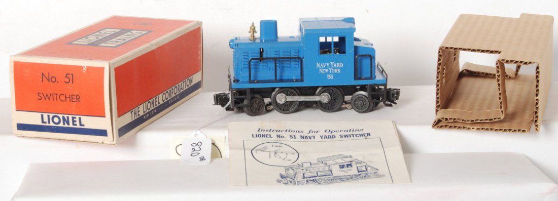 Lionel No. 51 Navy Yard switcher in OB: Postwar Lionel O gauge No. 51 Navy Yard industrial diesel switcher in original box with insert and original instructions sheet. Loco has hairline at rear screw, O/W C7. Box has small puncture to an en
