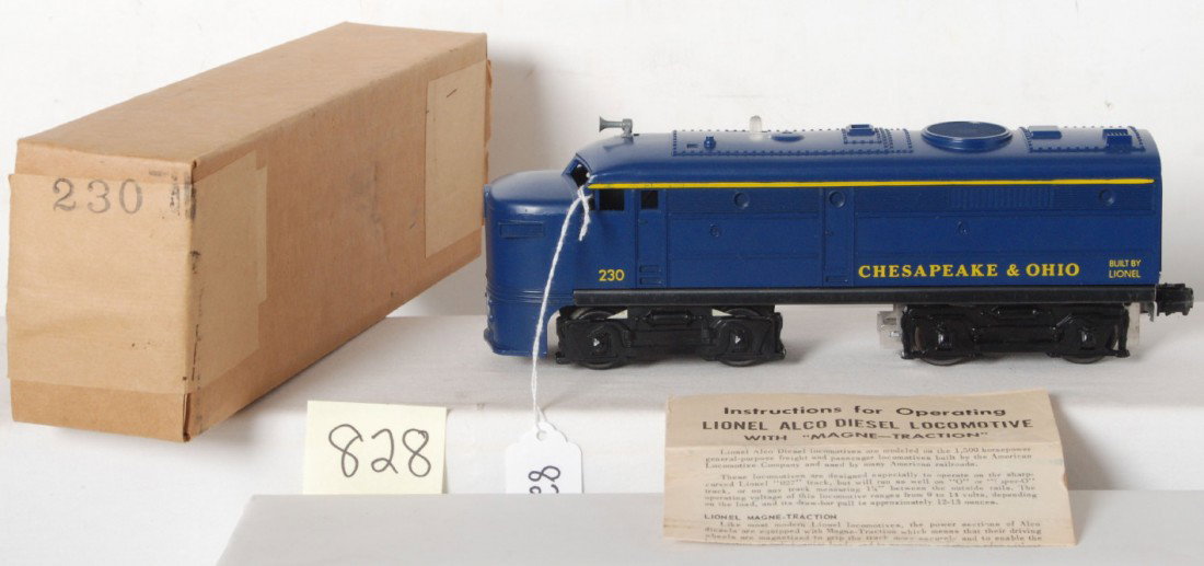 Lionel No. 230 Chesapeake and Ohio in OB w/instr.: Postwar Lionel O gauge No. 230 Chesapeake and Ohio diesel Alco A unit in original box with wrapping paper and instructions sheet, fantastic clean C8+. Box looks C9 area.