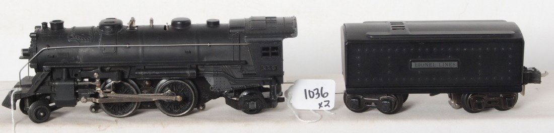 Lionel No. 229 steam locomotive and No. 2689T whi: Prewar Lionel O gauge No. 229 steam locomotive and No. 2689T tender with whistle. Loco has what looks like soap residue. Tender has tiny touchups. Trains should clean and polish to look C7 area.