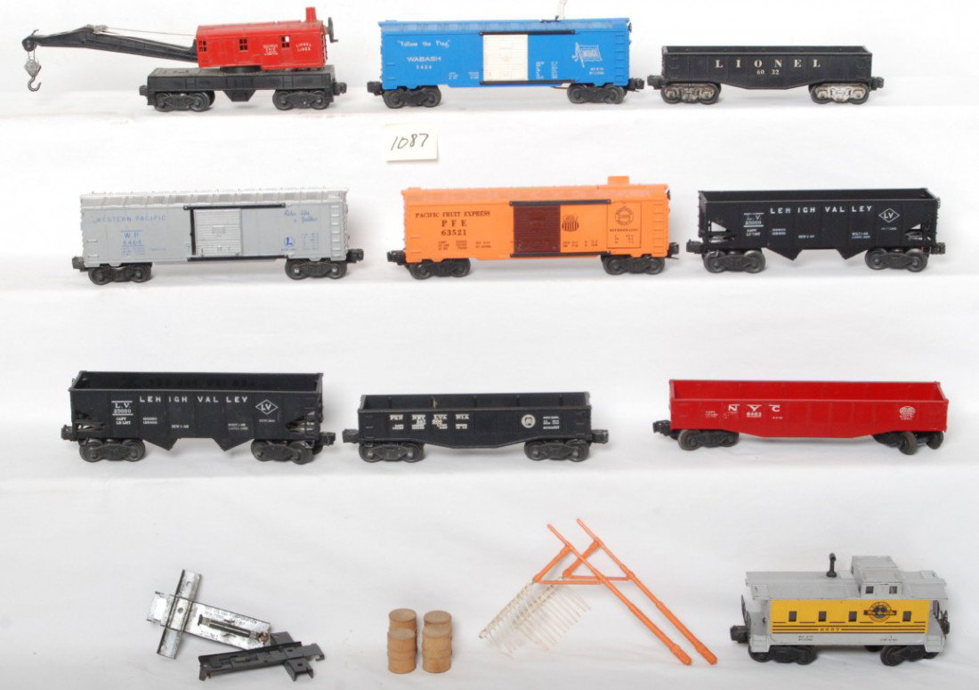 Nice large lot of Lionel freight cars, some opera: Postwar Lionel O gauge freight cars, No. 2452 Pennsylvania gondola, 6032 gondola, 6462 New York Central gondola, two 2456 Lehigh Valley hoppers, 6464-1 Western Pacific boxcar, 6352 Pacific Fruit Expre