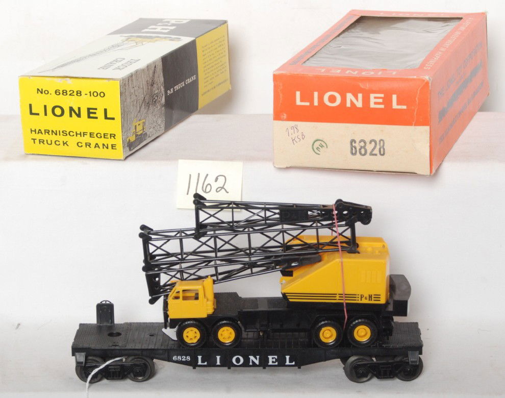 Lionel No. 6828 and No. 6828-100 Harnischfeger in: Postwar Lionel O gauge No. 6828 -100 Harnischfeger truck crane in Hillside cellophane display box No. 6828. Unrun flatcar, C9-10. Unassembled truck crane with complete components/assembly envelope, C9