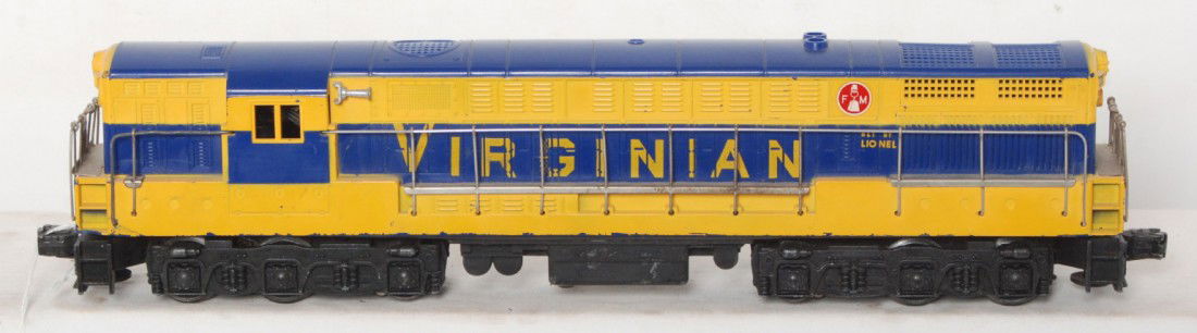Lionel No. 2331 Virginian Fairbanks Morse Trainma: Postwar Lionel O gauge No. 2331 Virginian Fairbanks Morse Trainmaster diesel locomotive with typical hairlines at screws and a hairline in cab roof, otherwise train looks nicer clean and shiny C6 area