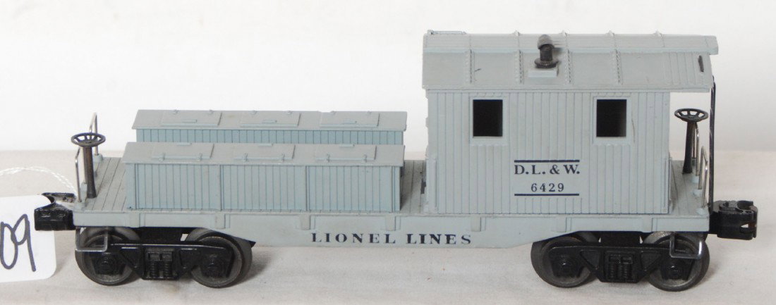 Lionel postwar O gauge 6429 DLW work caboose: More unusual Lionel postwar O gauge 6429 DLW work caboose, nice looking C7+ but does have one small nick on tool box edge.