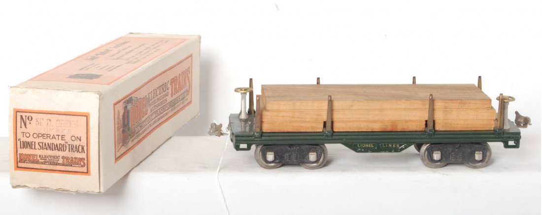 Lionel prewar SG 511 flat car with lumber, OB: Lionel prewar standard gauge 511 flat car with lumber, all original C7. Box has wear.