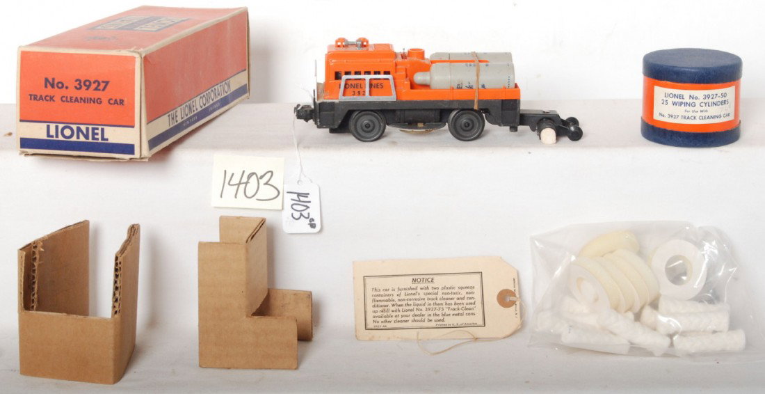 Lionel 3927 track cleaning car in OB: Postwar Lionel O gauge No. 3927 track cleaning car with two fluid bottles, 3927-46 tag, two inserts, 3927-50 25 wiping cylinders carton w/twenty-one cylinders, repro wipes. Train looks better C6. Box 