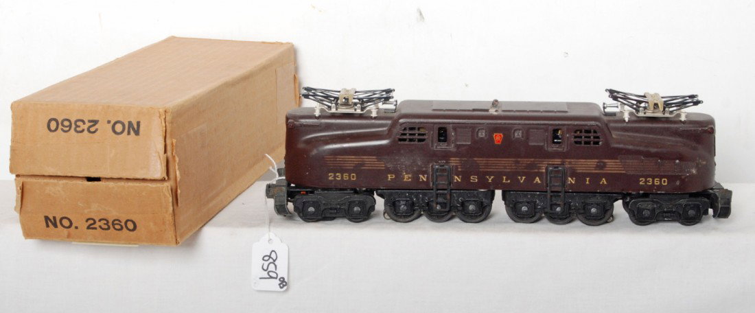 Lionel 2360 Pennsylvania GG-1 in OB Tuscan 5 strip: Postwar Lionel O ga. 2360 Pennsylvania GG-1 electric locomotive, Tuscan 5 stripe C6. Box is opened on both ends C7-8.