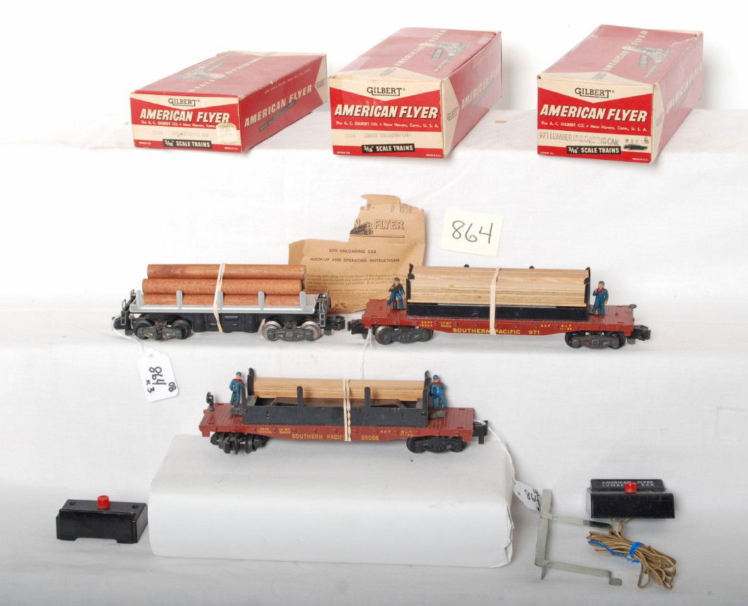 American Flyer 25058, 25003, 971 in OB: Postwar American Flyer S ga. 25058 Southern Pacific lumber unloading car in 25016 OB w/contact rail, controller and partial load, 25003 log unloading car w/logs and instructions sheet, and 971 lumber