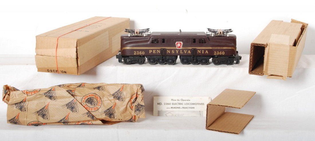 Incredible 1957 2360 painted stripe GG1, OB: WOW! Lionel postwar O gauge 2360 GG1 from 1957 with painted stripe. This engine is the real deal, never polished so it still has the brand new look to it, all original, very faint test run shows on ro
