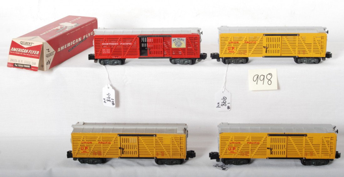American Flyer 994, 994, 24076, and 24077. One OB: Postwar American Flyer S ga. stock cars, C6-7. Two 994 Union Pacific (one chipped catwalk end and hairline at screw), 24076 Union Pacific, and 24077 Northern Pacific Pig Palace w/knuckle couplers. 240