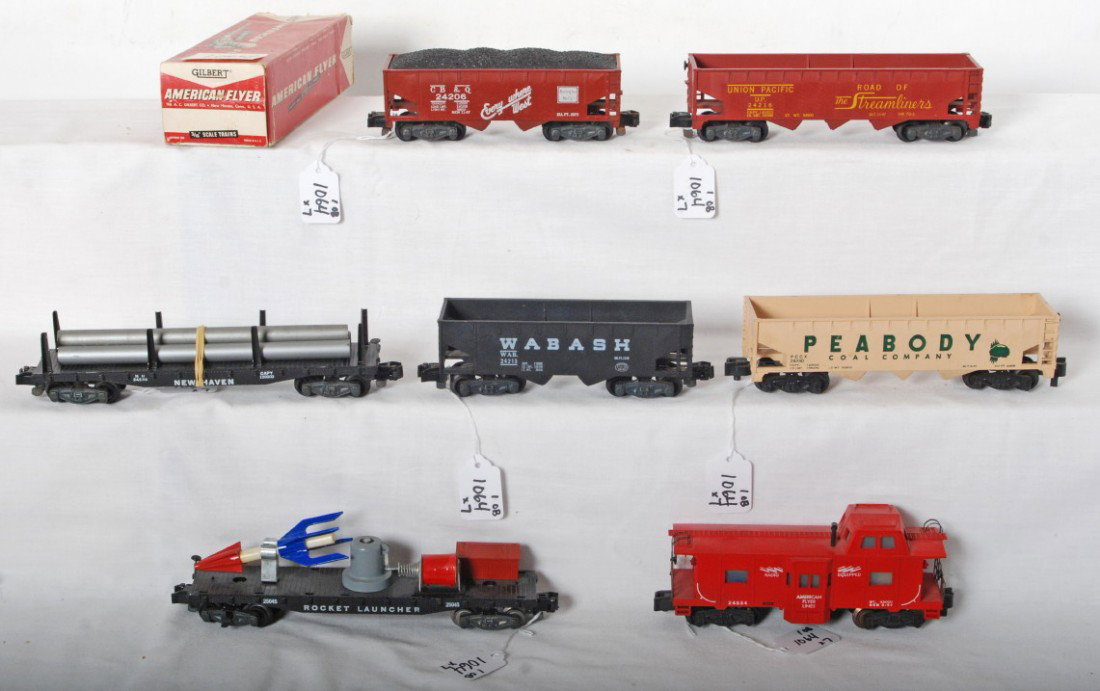American Flyer 25045, 24213, 24230, 24539, 24216.: Postwar American Flyer S ga. 25045 rocket launcher, 24213 Wabash hopper, 24230 Peabody Coal Co. hopper, 24539 New Haven flatcar, 24216 Union Pacific hopper, 24206 C.B.&Q. coal hopper w/load, and 24634