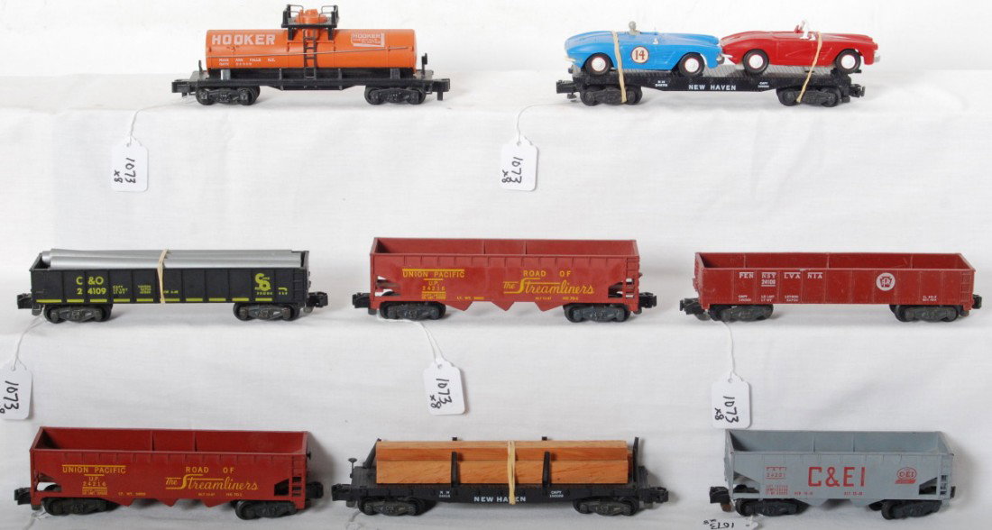 American Flyer 24221, 24329, 24106, 24216, more: Postwar American Flyer S ga. 24221 C&EI hopper (missing a step and coupler knuckle), 24329 Hooker tank (missing a step), 24106 Pennsylvania sand car, two 24216 Union Pacific hoppers, 24516 New Haven f