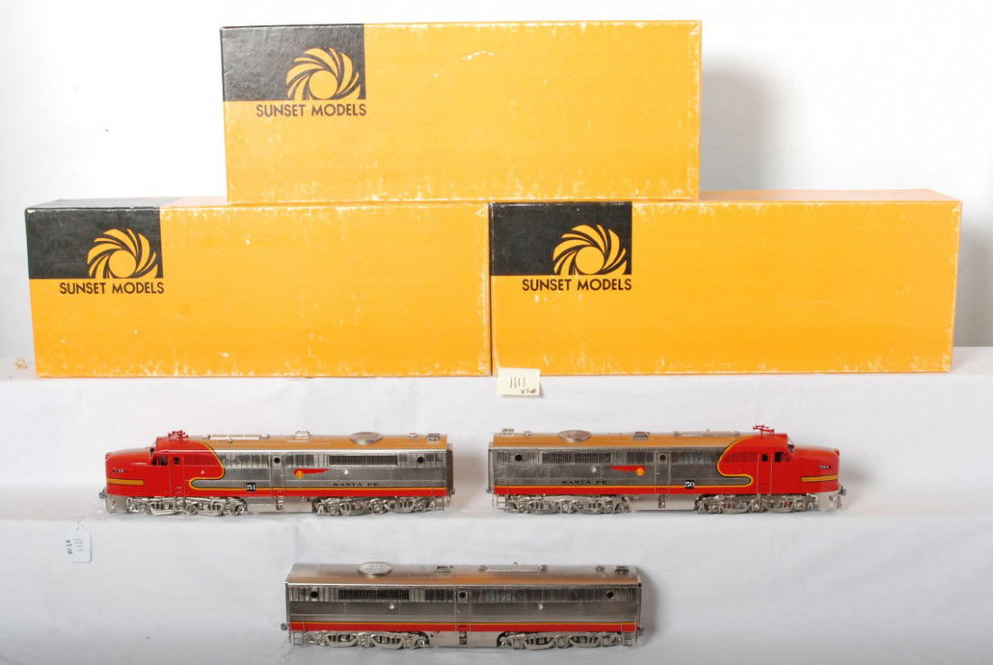 Sunset 2 Rail Santa Fe Alco PA A-B-A: Sunset O scale two rail brass Santa Fe Alco PA A-B-A diesel locomotive set in OBs. Models were produced by Dongjin and are C8-9 condition with no major signs of run time. On the powered A unit however