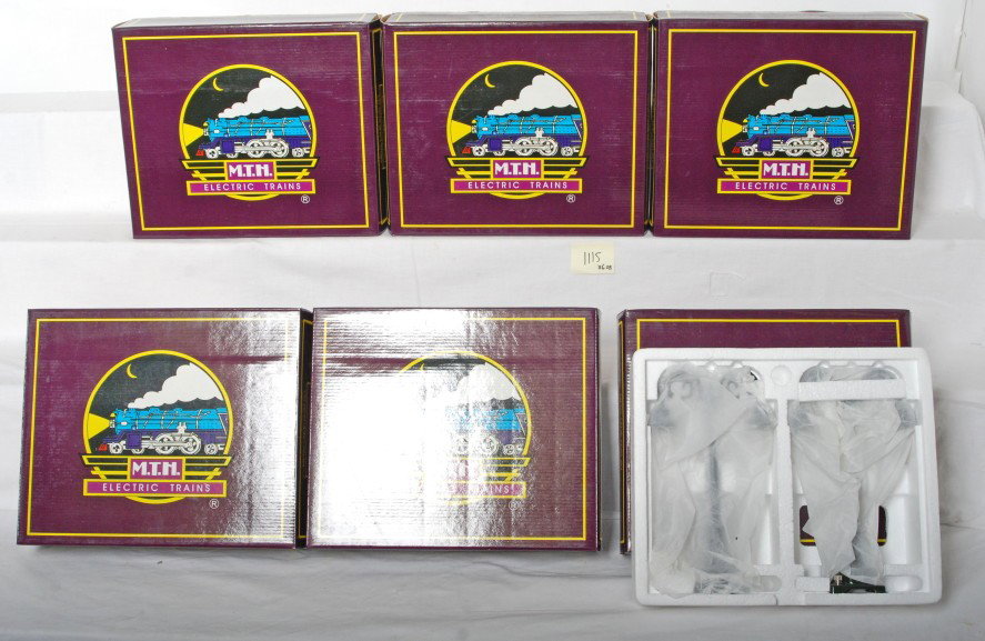 6 MTH No. 54 lamp post sets: MTH modern standard gauge tinplate No. 54 MT-1020 green lamp post sets in OBs. Six sets total in C8 condition.