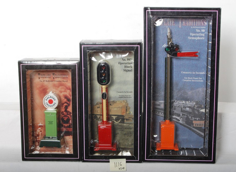 3 MTH Tinplate accessories 87, 99N, and 80: MTH modern standard gauge tinplate accessories in OBs. Includes 10-1096 No. 87 crossing, 10-1048 No. 99N block signal, and 10-1047 No. 80 semaphore. Items are C8-9. OBs have light corner and edge wear