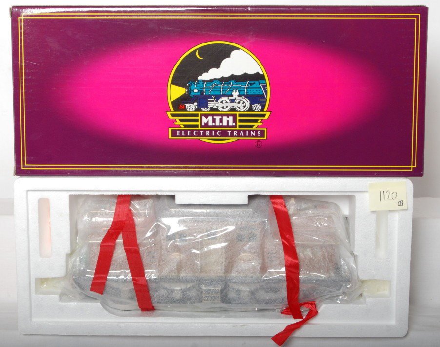 MTH two tone brown 408E electric locomotive: MTH modern standard gauge tinplate MT-1023 two tone brown 408E electric locomotive in OB. Loco is factory wrapped C10 in the OB.