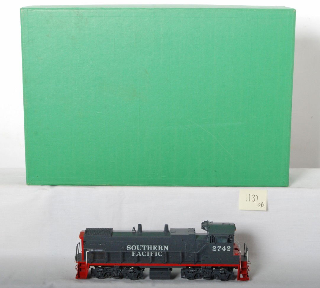Overland Southern Pacific MP-15 switcher: Overland O scale two rail brass Southern Pacific MP-15 diesel locomotive in OB. Product number is OMI-0391. Loco is C9-10 displayed only with only signs of factory running. No couplers installed.