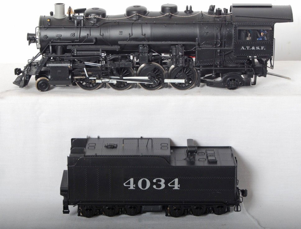 Max Gray brass Santa Fe 2-8-2 steam locomotive: Max Gray O scale two rail brass Santa Fe 2-8-2 steam locomotive. Loco is C8-9 area and looks displayed only with run time. See photos for best description.