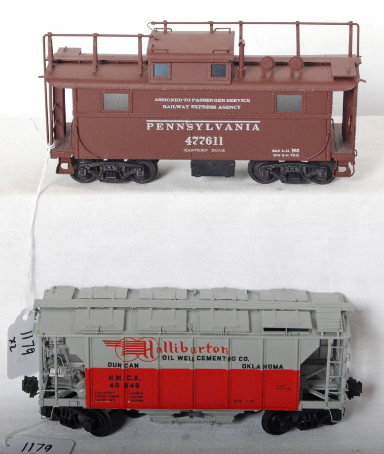 2 brass freight cars PRR caboose and Halliburton: O scale two rail brass freight cars. Two cars include Halliburton cementing hopper and Pennsylvania Eastern zone N5 caboose. Cars are generally C8 condition. See photos for best description, no makers