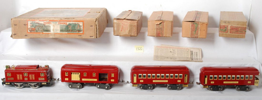 Boxed Lionel 8E loco, 332, 337, 338 pass. set: Prewar Lionel standard gauge boxed set with no set number. Set is comprised of 8E electric loco, 332 Railway Mail, 337 Pullman and 338 observation, passenger cars all in red. Trains have some small to