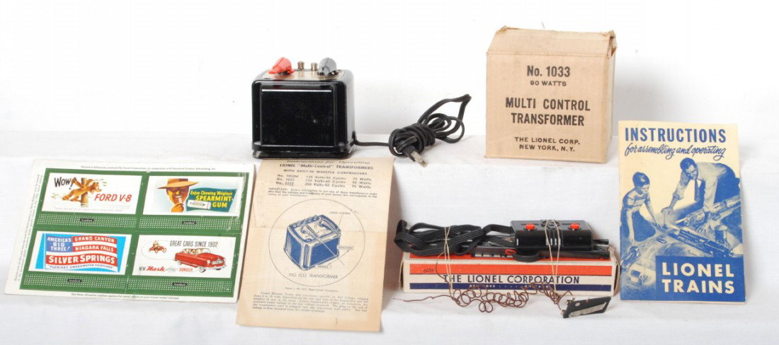 Misc Lionel items incl. 1033, 1950 billboards etc: Misc Lionel postwar items including a boxed 1033 transformer, 1950 uncut billboard sheet, warranty card, 1950 instruction booklet and a boxed 6019 section. C7-9.