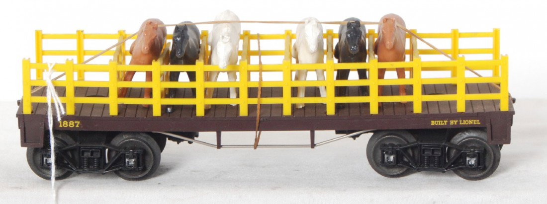 Mint Lionel 1887 flat from Halloween set: Lionel postwar O gauge flatcar with original horses from the (in)famous Halloween General set, unrun, C9-10.