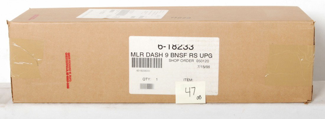 Lionel BNSF 18233 Dash 9: Lionel modern O gauge 18233 BNSF dash 9 diesel locomotive in OB. Loco features Railsounds, dual motors, ditch lights and can be upgraded to TMCC. Loco is factory sealed in master C10.