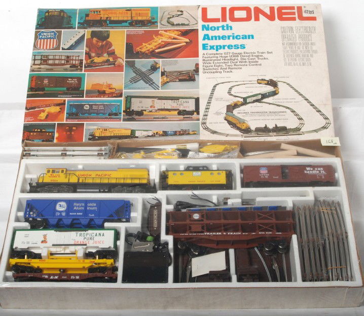 Lionel North American Express Set 1560 LN OB: Lionel modern O gauge North American Express freight set no. 1560 in OB complete with all accessories, and sealed in factory plastic. Set lid has some corner and edge wear along with dirt. Trains are