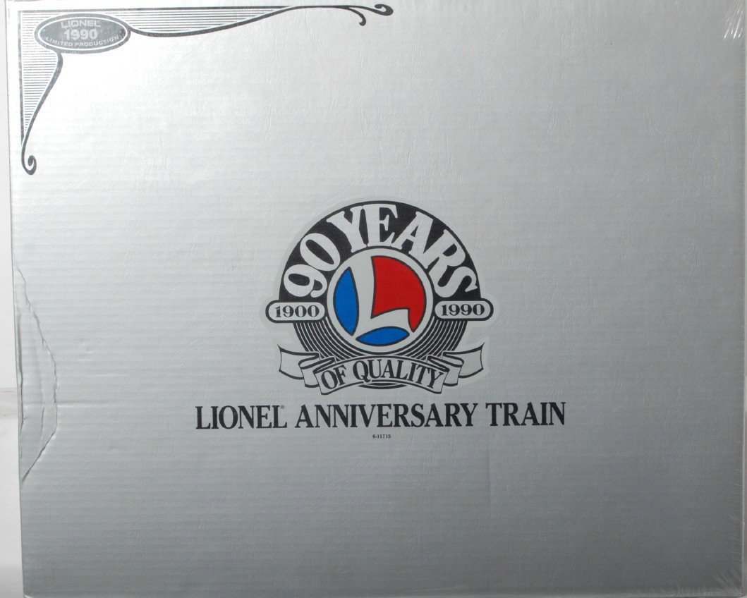 Lionel 90th Anniversary Train Set 11715: Lionel modern O gauge 90th Anniversary train set no. 11715 factory sealed in OB wrapped in cellophane, C10. Light crease in one edge of set lid.