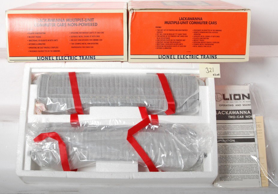 Lionel Lackawanna MU sets 18304 18305: Lionel modern O Gauge Lackawanna commuter car sets in OBs. Includes 18304 set with powered unit and 18305 dummy set. Opened for inspection only. Cars are C10. OBs do have some corner and light shelf w