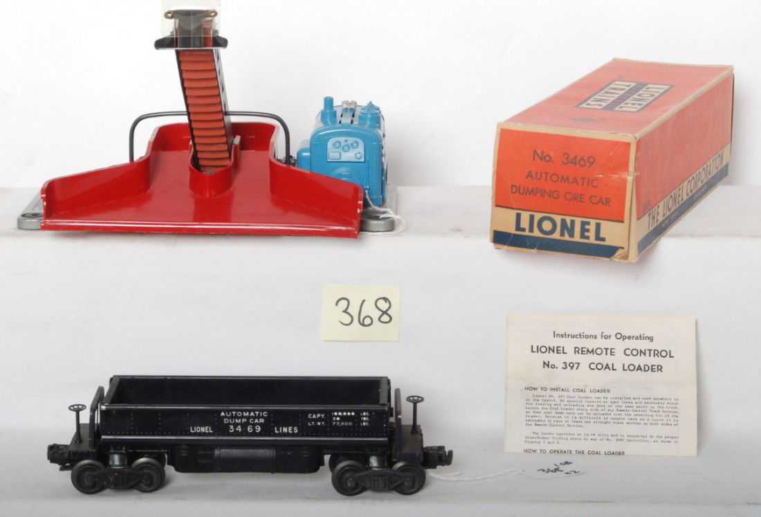 Lionel 3469 auto dump car in OB, and 397 coal load: Postwar Lionel O gauge No. 3469 automatic dump car in original box and 397 coal loader, C6. 397 instructions sheet included. 3469 OB is square and solid with no missing flaps.