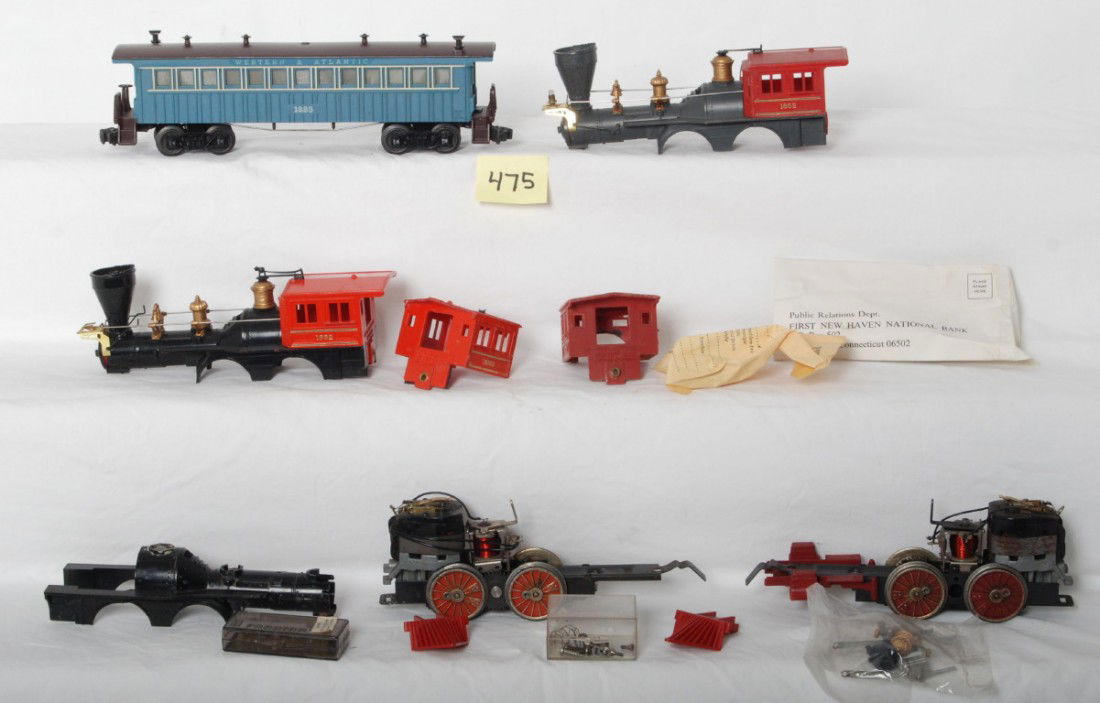 Lot of Western and Atlantic RR items, locos, pass.: Postwar Lionel O gauge 1862 and 1868 loco shells, two chassis, 1862 and 1868 cabs, and other parts. 1885 Western and Atlantic passenger coach (C6). Please view the photos of the items in this lot, the